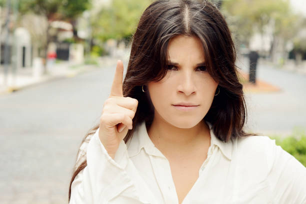 istock Angry young woman shouting 1043685370