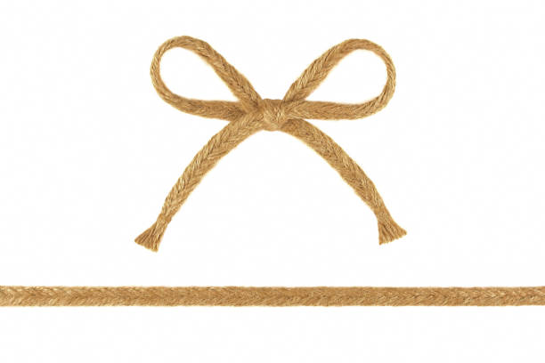 istock Burlap jute ribbon and bow isolated on white background 1043688754