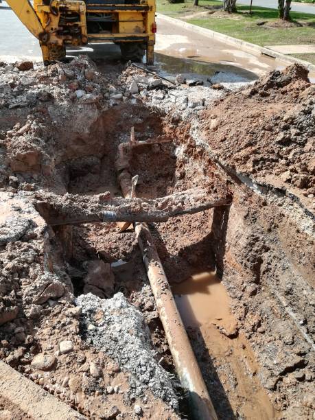 istock A cracked underground asbestos pipe which is leaking large amounts of water. 1043690186
