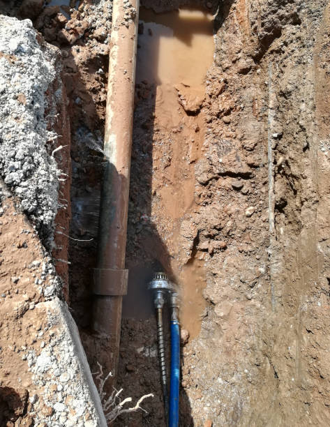 istock A cracked underground asbestos pipe which is leaking large amounts of water. 1043690240