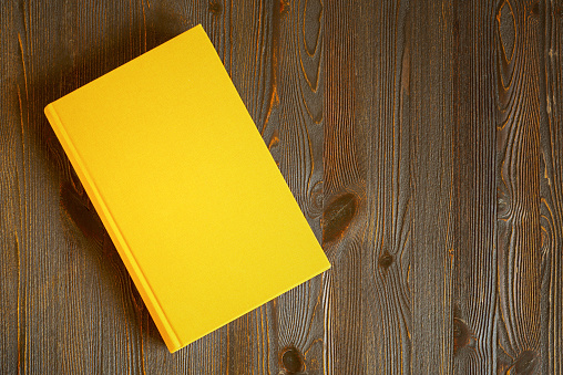 Yellow book on the table