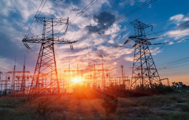 istock distribution electric substation with power lines and transformers. 1043698942