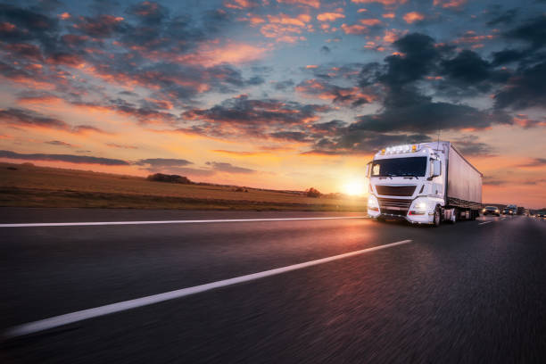 truck with container on road, cargo transportation concept. - personal land vehicle imagens e fotografias de stock