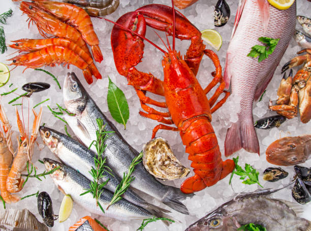 istock Fresh tasty seafood served on old wooden table. 1043700534