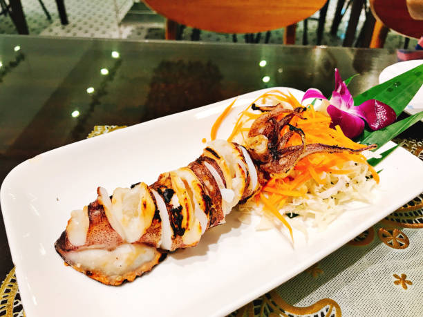 istock A dish of Thai style grilled squid. 1043700754