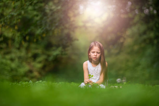 istock Lonely young girl in nature. 1043708262