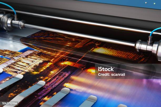 Printing Photo Banner On Large Format Color Plotter Stock Photo - Download Image Now
