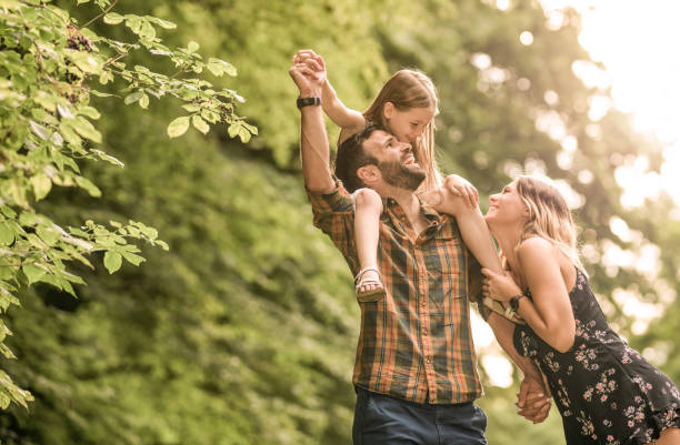 istock Young family having fun outdoors. 1043720264