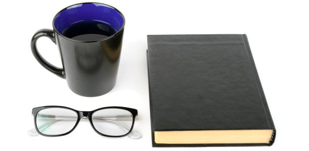 istock Book, cup with tea and glasses isolated on white background. 1043724242