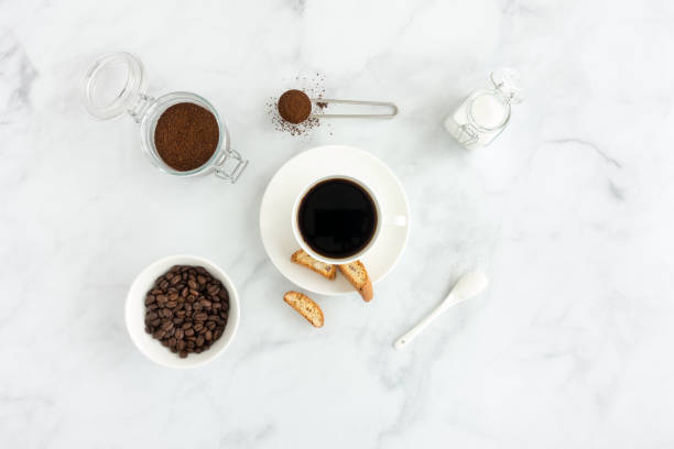istock Black Coffee, Cantucci, Cup, Sugar, Ground Coffee and Beans 1043725792