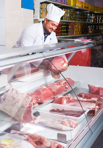 istock staff selling halal meat 1043730230