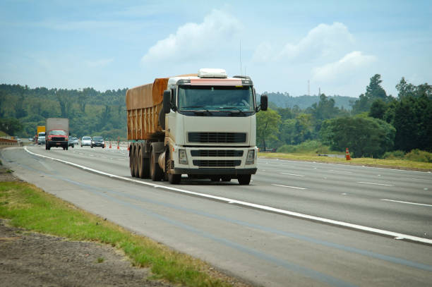 large eighteen wheeler with canvas covered load