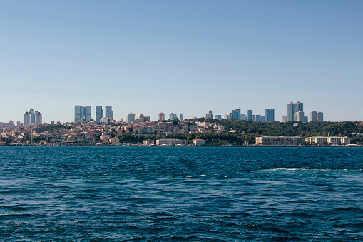 View of Bosphorus and European side in Istanbul. It is a sunny summer day. Skyscrapers are also in the view.