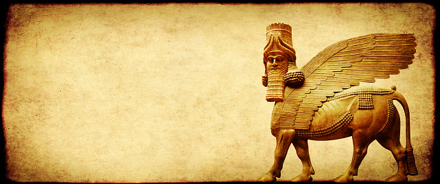 Grunge background with paper texture and lamassu - human-headed winged bull statue, Assyrian protective deity. Copy space for text. Mock up template