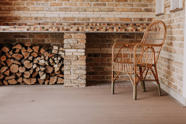 istock wicker chair stands on autumn veranda. 1043747522