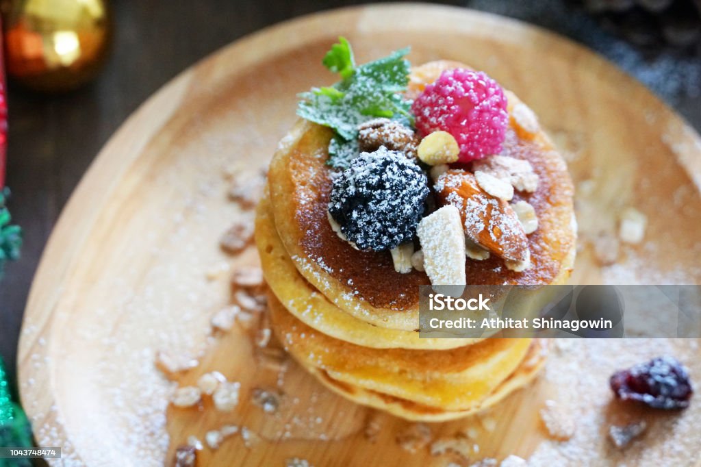 Topview pancake topping with berries and nut , holiday party dessert. Pancake Stock Photo