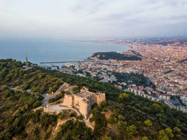 Photo of Aerial view of Fort du Mont Alban and the city of Nice at sunrise