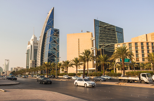 RIYADH, SAUDI ARABIA - OCTOBER 10, 2015. King Fahd's street road in Riyadh in daylight with skyscrapers and other buildings on the back