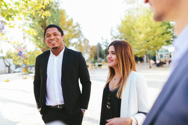 istock Multi-ethnic business people discussing outdoors 1043755742