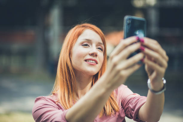 istock Woman making a self portrait . 1043766064