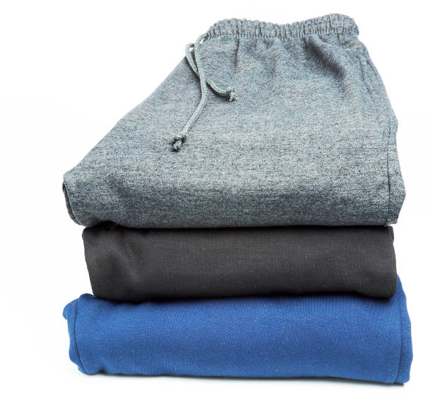 stacked fleece pants stacked fleece pants jogging pants stock pictures, royalty-free photos & images