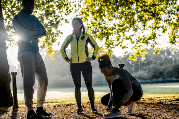 istock Group of friends talking about running results 1043775398