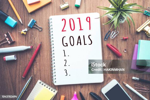 2019 Goals Text On Notepad With Office Accessoriesbusiness Plandirection Concepts Stock Photo - Download Image Now