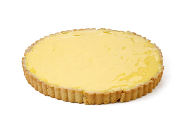 istock lemon tart isolated on white background 1043796326