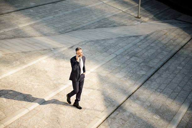 istock Overview of a smiling businessman. 1043807364
