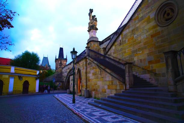 istock Stairs leading to Charles bridge at dusk 1043807374