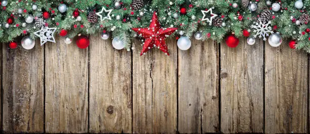 Christmas Banner - Star And Snowy Fir Branches On wooden Plank