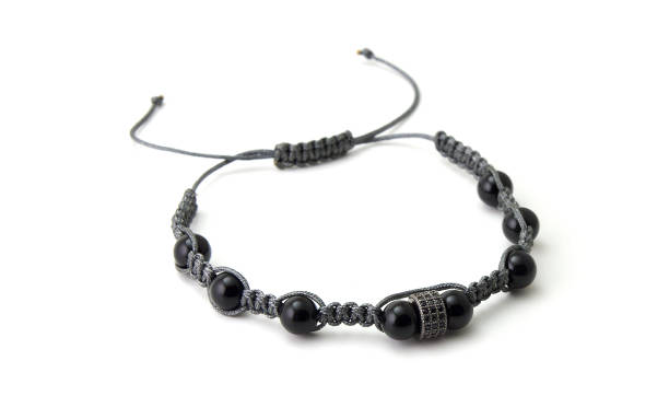 istock Black onyx macrame model bracelet isolated on white 1043818698