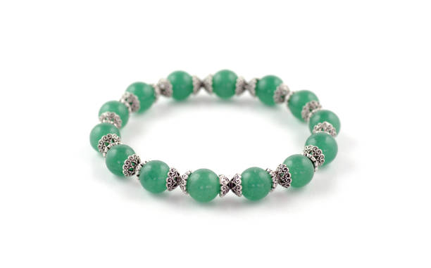 istock Green aventurine beads bracelet isolated on white 1043818764