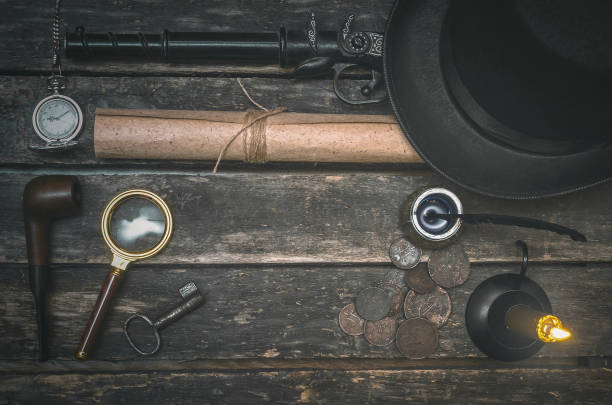 Detective agent table. Detective agent equipment and accessories on the retro style table background. Compromising evidence. wallet gun stock pictures, royalty-free photos & images