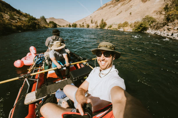 istock Group of Friends Raft Down Deschutes River in Eastern Oregon 1043818930