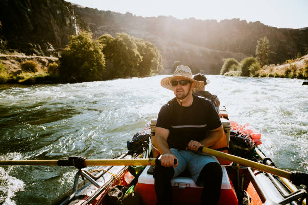 A fun end of summer vacation, a group of men take a casual rafting trip on the Deschutes River in Oregon state, enjoying white water rapids and fly fishing.  Three day trip, starting in Warm Springs and pulling out in Maupin.