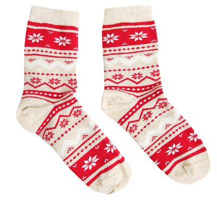 Pair socks with red winter holiday ornaments isolated.