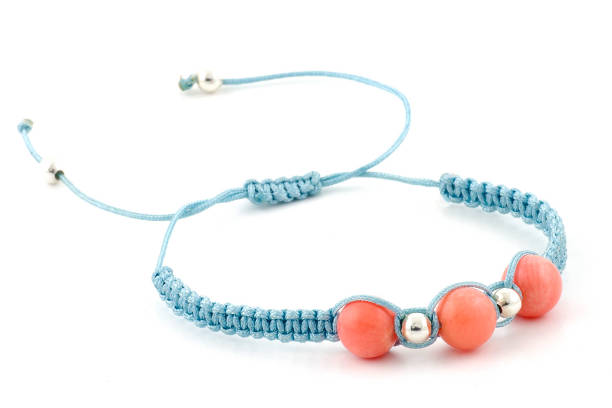 istock Blue color macrame bracelet with pink coral beads 1043828458