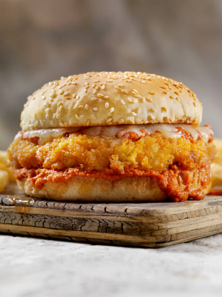 istock Chicken Parmesan Burger with Fries 1043829198