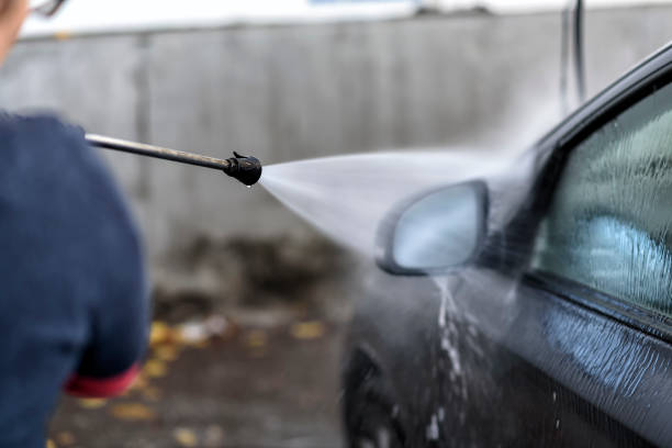 istock washing a car at the car wash 1043832162