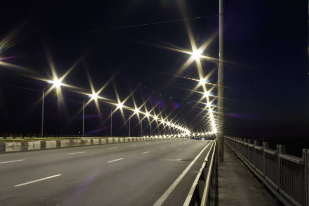 istock Colorful light trace from night traffic on the highway bridge 1043832208