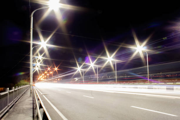 istock Colorful light trace from night traffic on the highway bridge 1043832344