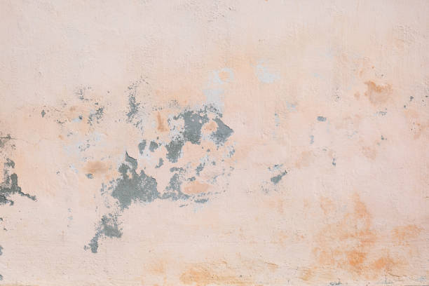 istock Grungy wall background texture with peeling paint 1043836990