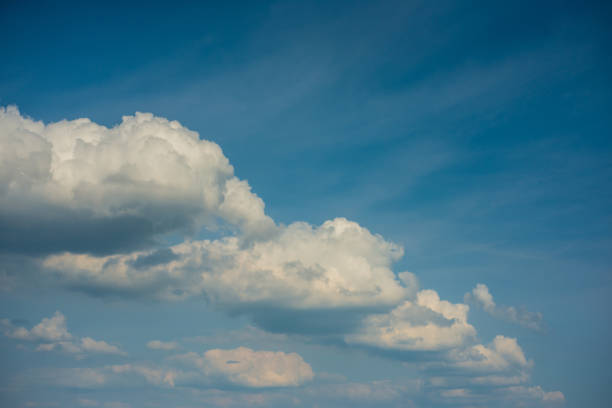 istock Blue sky with white clouds bright Sunny day 1043837754