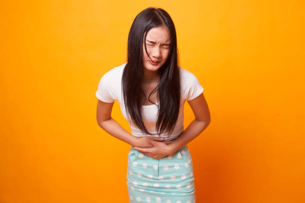istock Young Asian woman got stomachache. 1043837982