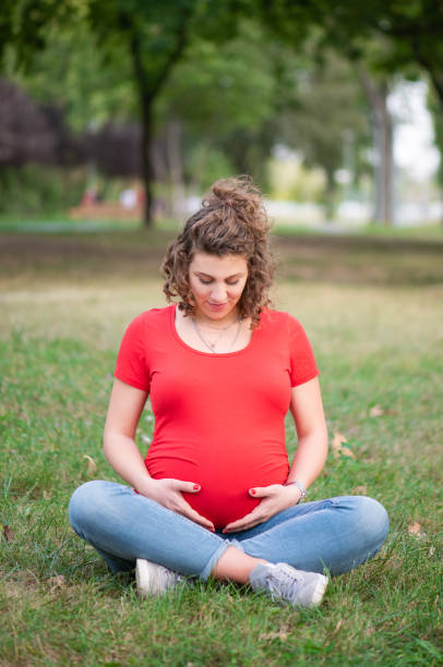 istock Pregnant woman practicing yoga 1043844622