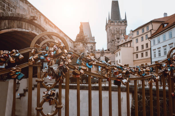 Fence With Love Locks On Charles Bridge In Prague, Czech Republic Fence With Love Locks On Charles Bridge In Prague, Czech Republic former czechoslovakia stock pictures, royalty-free photos & images