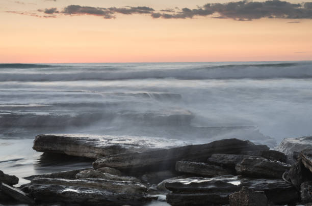 istock Beautiful dramatic Sunset over a rocky coast 1043860246