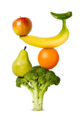 Various fruit and vegetables arranged to symbolise a balanced diet