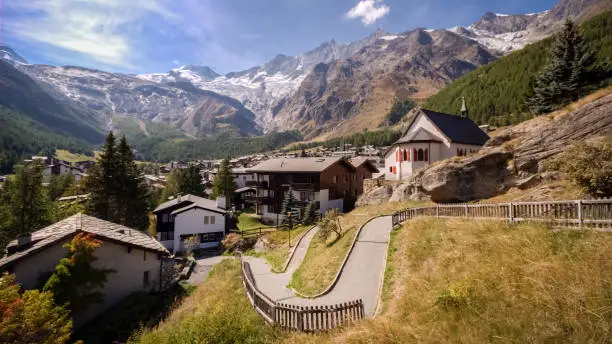 On a late september day the sun is shining on Saas-Fee, the main village in the Saastal, or the Saas Valley, and is a municipality in the district of Visp in the canton of Valais in Switzerland. The villages in its neighborhood are Saas-Almagell, Saas-Grund and Saas-Balen.